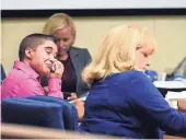  ?? AMY SMOTHERMAN BURGESS, KNOXVILLE NEWS SENTINEL ?? Erica Witt tears up after she is denied same-sex parenting rights in June 2016 during a hearing in Knoxville. That decision has been reversed by Judge Greg McMillan of the Fourth Circuit Court.