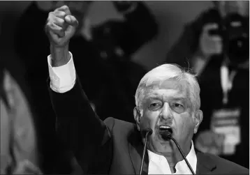  ?? ASSOCIATED PRESS ?? PRESIDENT-ELECT ANDRES MANUEL LOPEZ OBRADOR DELIVERS HIS VICTORY SPEECH in Mexico City’s main square, the Zocalo, late Sunday. Angry and frustrated over corruption and violence, Mexican voters delivered a tidal wave presidenti­al election victory to...