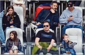 ?? ?? Rob Carr/Getty Images
Elon Musk watches the first half of the Super Bowl at Allegiant Stadium in Las Vegas on Sunday. Musk’s purchase of Twitter in 2022 perplexed industry analysts.
