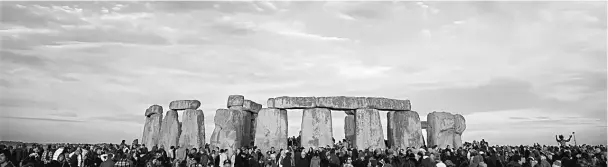  ??  ?? People attend the annual summer solstice at the Stonehenge monument on Salisbury Plain in Wiltshire, southern England in this file photo. — Reuters photo