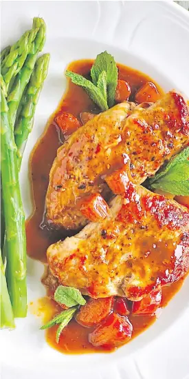  ??  ?? Pork Medallions with Orange Balsamic Rhubarb Sauce is a lip-smacking budget-friendly meal that highlights the rich, red tang of local rhubarb.