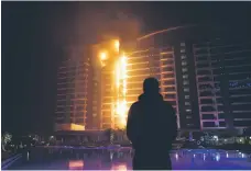 ?? Gary Barnett ?? The Adriatic building fire on the Palm Jumeirah in Dubai was one of several blazes that resulted in a new safety code