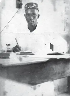  ??  ?? Alhaji Badisha in his office at John Holt in Sokoto in 1954