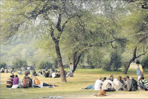  ?? HT PHOTO ?? The Sanjay Jheel Park in Mayur Vihar is guarded by just 10 men with lathis. It is notorious for snatching.