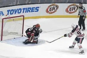  ?? REED SAXON/THE ASSOCIATED PRESS ?? Edmonton Oilers captain Connor McDavid scores the game-winning goal in a shootout past Anaheim Ducks goaltender Ryan Miller on Sunday in Anaheim, Calif. The Oilers won 6-5.