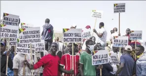 ?? Photo: RFI ?? Unhappy… The crowd shouted “Macky Sall dictator” and “Free Sonko”, singing a song in his praise.