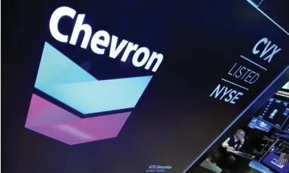  ?? ?? Chevron and Hess said the combined company would grow production and free cashflow faster and for longer. Photograph: Richard Drew/AP