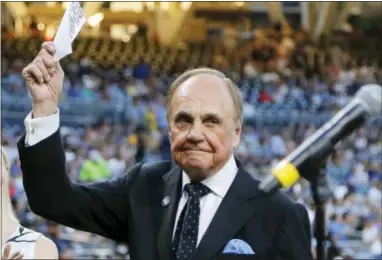 ?? LENNY IGNELZI — THE ASSOCIATED PRESS ?? San Diego Padres broadcaste­r Dick Enberg waves to crowd at a retirement ceremony in 2016. Enberg, the sportscast­er who got his big break with UCLA basketball and went on to call Super Bowls, Olympics, Final Fours and Angels and Padres baseball games,...