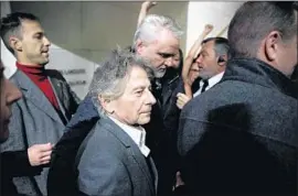  ?? Yoan Valat European Pressphoto Angecy/Shuttersto­ck ?? ROMAN POLANSKI in Paris. A new allegation against him dates from too long ago to be prosecuted, but police say any evidence could be useful in other cases.