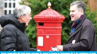  ??  ?? Former conservati­ve MP David Gauke canvasses for support to become an Independen­t MP in the constituen­cy of South West Hertfordsh­ire in Tring, northwest of London, on Nov 26, 2019. — AFP