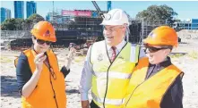  ?? Picture: JOHN GASS ?? Criena Gehrke, Tom Tate and Robyn Archer during constructi­on of the new cultural precinct.