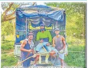  ?? Picture: SUPPLIED ?? Isireli Vuibau (right) with his friend Seru (on the left) and a cassava stem buyer. He made $500 of sales that day.