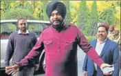  ??  ?? Local bodies minister Navjot Singh reaches the Vidhan Sabha to attend the assembly session on Thursday.