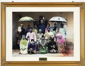  ??  ?? (chromogeni­c print and plaque in artist’s frame, 2012) shows an ethnic Indian family dressed in Malay clothes, a commentary on cultural assimilati­on in Malaysia.