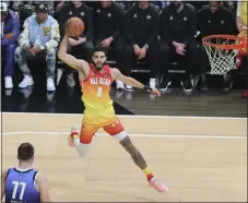  ?? ROB GRAY — THE ASSOCIATED PRESS ?? Team Giannis forward Jayson Tatum drives during the NBA All-star game Sunday in Salt Lake City.