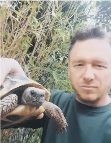  ?? ?? Mike Killner with Dave the tortoise