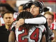  ?? CURTIS COMPTON / CCOMPTON@AJC.COM ?? Falcons coach Dan Quinn has been teaching a rugby-style tackling method that keeps the head out of the play.