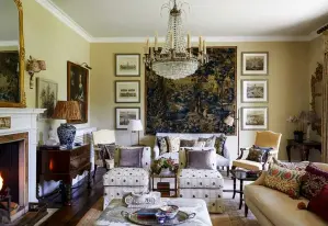  ??  ?? ABOVE An antique chandelier takes centre stage in this drawing room by Henriette.
