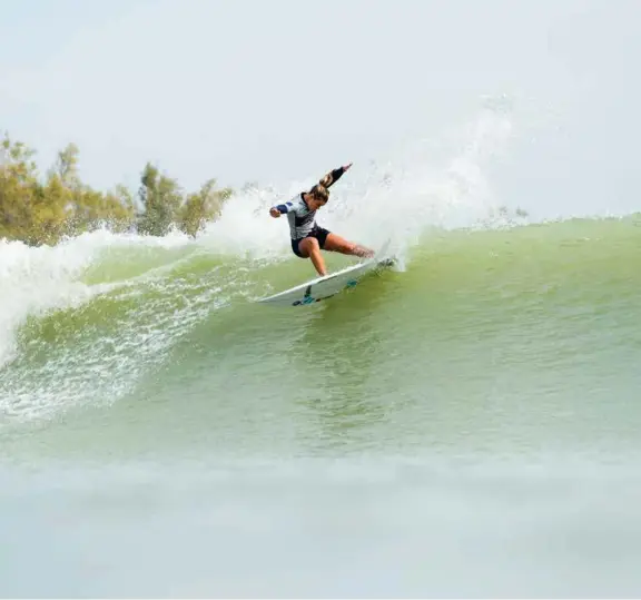  ??  ?? ABOVE: Hard to believe this wave is miles from any ocean... Kelly Slater's wave pool provided the perfect platform for Paige Hareb to showcase her talents