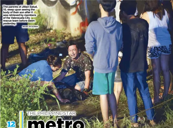  ?? MIGUEL DE GUZMAN ?? The parents of Jillian Salud, 10, weep upon seeing the body of their son after it was retrieved by members of the Valenzuela City rescue team before dawn yesterday.