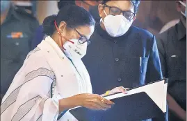  ??  ?? Trinamool Congress leader Mamata Banerjee at the oath-taking ceremony for a third consecutiv­e term at the Governor’s House in Kolkata on Wednesday.