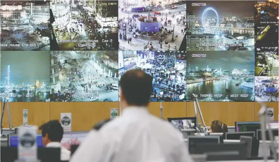  ?? DANIEL BEREHULAK/GETTY IMAGES ?? A bank of television monitors displays images captured by London’s CCTV camera network within the Metropolit­an Police’s Special Operations Room.