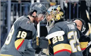  ?? CP PHOTO ?? Vegas Golden Knights left wing James Neal, left, celebrates the team’s 3-2 win with Marc-Andre Fleury after Game 4 of the NHL hockey Western Conference finals against the Winnipeg Jets on May 18 in Las Vegas. Fleury didn’t take long becoming a fan...