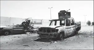  ?? (Associated Press) ?? Destroyed military vehicles in Khartoum, Sudan, on April 20