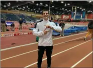  ?? UNIVERSITY OF AKRON ATHLETICS ?? Lake Catholic graduate Matt Ludwig is all smiles after winning the USATF Indoor national title in the pole vault Feb. 14.