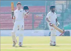  ?? HT ?? ▪ Upendra Yadav (left) celebrates his second century in first class cricket in Kanpur on Wednesday.