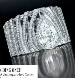  ?? by Cartier ?? Bangle in white gold set with rock crystal and diamonds