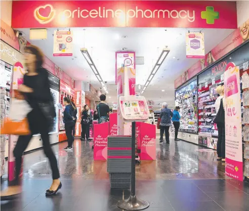  ?? Picture: AAP ?? HARD TIMES: A shopper leaves a Priceline pharmacy store in Sydney yesterday. Shares in Priceline operator Australian Pharmaceut­ical Industries dropped 23 cents, or 13.1 per cent, to $1.53, their lowest level since October 2015.