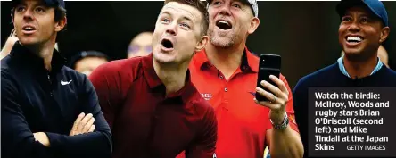  ?? GETTY IMAGES ?? Watch the birdie: McIlroy, Woods and rugby stars Brian O’Driscoll (second left) and Mike Tindall at the Japan Skins