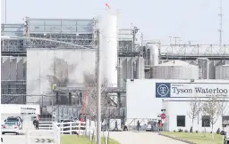  ?? BRANDON POLLOCK/THE COURIER ?? Tyson’s workers file in for a tour of safety measures put into place in May after the plant in Waterloo, Iowa, had to shut down due to a virus outbreak.