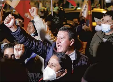  ?? Guadalupe Prado Associated Press ?? SUPPORTERS of Pedro Castillo celebrate in Lima last week after he was declared president-elect of Peru. The populist, who ran on the slogan, “No more poor in a rich country,” will be running a deeply divided nation.