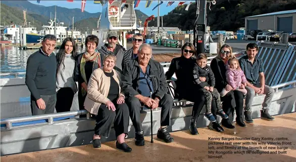  ??  ?? Kenny Barges founder Gary Kenny, centre, pictured last year with his wife Valerie, front left, and family at the launch of new barge MV Rongotia which he designed and built himself.