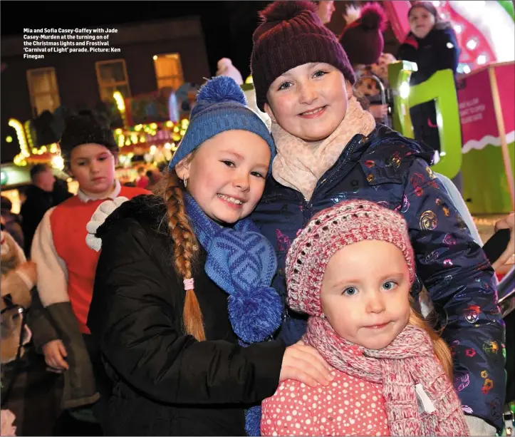  ??  ?? Mia and Sofia Casey-Gaffey with Jade Casey-Murden at the turning on of the Christmas lights and Frostival ‘Carnival of Light’ parade. Picture: Ken Finegan