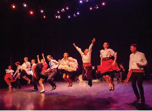  ??  ?? Dance artists of Louis Riel Métis Dancers / Photo by Chris Randle