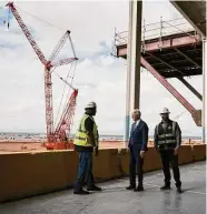  ?? T.J. Kirkpatric­k/New York Times ?? President Joe Biden chats with constructi­on workers at the site of TSMC’s Arizona plant in Phoenix on Dec. 6. The CHIPS Act is a prime piece of Biden’s industrial policy.