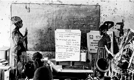  ?? CHARLES ATIKI LOMODONG/AP ?? Trainees demonstrat­e social distancing Aug. 18 at a session for community health workers conducted by the national NGO Health Link in South Sudan.