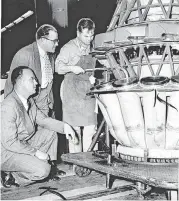  ?? [THE OKLAHOMAN ARCHIVES] ?? Technical experts from the Middletown, Pa., air depot observe as a worker at Tinker’s maintenanc­e depot overhauls a jet engine in 1949. The air logistics complex at Tinker continues to overhaul engines for a variety of aircraft today.