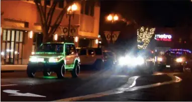  ?? RECORDER FILE PHOTO ?? In this file photo, vehicles are shown in last year’s Christmas Carol Parade Through Portervill­e. The event is being held again on Friday, December 16.