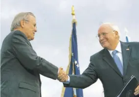  ?? (Photo: AP) ?? In this file photo, then outgoing Defense Secretary Donald H Rumsfeld (left) shakes hands with then Vice-president Dick Cheney at the Pentagon. All 10 living former secretarie­s of defense, including Rumsfeld and Cheney, have joined in cautioning against any attempt to use the military in the cause of overturnin­g the November 2020 presidenti­al election.