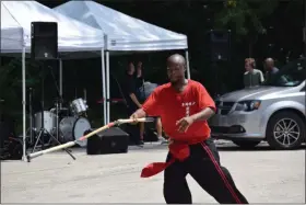  ?? MARIAN DENNIS — MEDIANEWS GROUP ?? Sifu Rome’s Hung Gar Kung Fu Academy puts on a Kung Fu demonstrat­ion for guests at this year’s Norristown Family Fun Day.