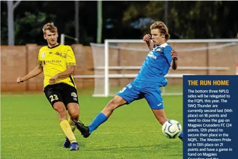  ??  ?? ON SONG: South West Queensland Thunder forward Dan Weber (right) closes down his Moreton Bay United opponent.