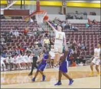  ?? The Sentinel-Record/James Leigh ?? HIGH POINT: Lake Hamilton senior guard Lane Kersey lays in two of his 29 points Friday during the Wolves’ 76-50 home victory against Star City at Wolf Arena.