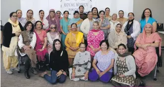  ?? PHOTOS: GRACE DIRKS ?? Gurmit Sarpal, centre in yellow, with the members of the Royal Women Associatio­n at a monthly meeting in the Genesis Centre, where they share their talents and encourage one another.