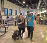  ?? JENNIFER CHANDLER ?? Blair Perry and Ryan Allen in the taproom of their Memphis brewery Soul & Spirits Brewery.