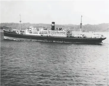  ?? NAVAL HISTORY AND HERITAGE COMMAND ?? The Montevideo Maru is shown in the Panama Canal on Dec. 25, 1937. It was later used by the Japanese military to transport prisoners. It became the first of the “hell ships” to be sunk by the U.S. Navy, on July 1, 1942, during a torpedo attack from the submarine Sturgeon (SS-187).