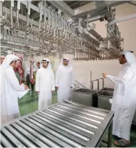  ?? — Supplied photo ?? Officials inspect the Ajman Municipali­ty abattoir.